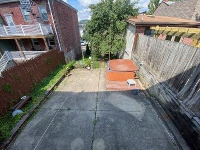 Backyard and hot tub - 3459 Denny St