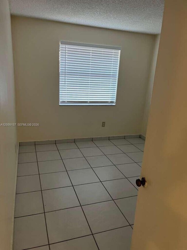 Building Photo - 9712 Hammocks Blvd