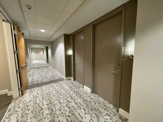 Building Photo - Modern High-Rise Condo in Downtown Orlando...