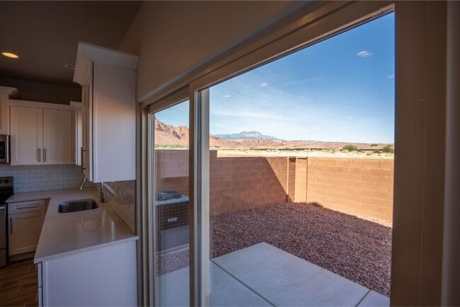 Building Photo - Amazing views! Like New 3 bedroom, 2.5 bath townhome, 2 car garage