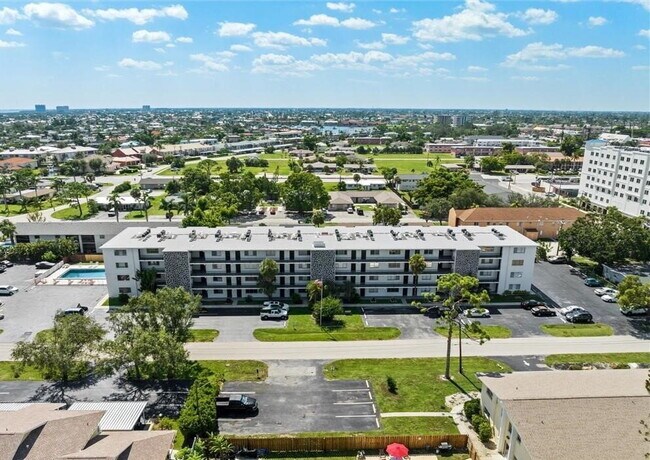 Building Photo - "Chic 2-Bed, 2-Bath Condo with Granite Finishes in Prime Cape Coral Location! 55 and older"