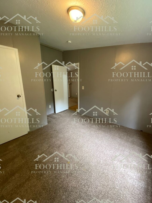 Building Photo - Spacious 4-Bedroom Double-Wide Mobile Home...