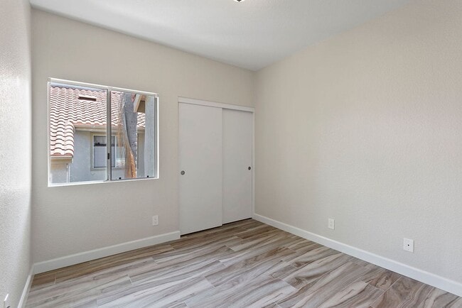 Building Photo - Move-In Special - 50% Off First Month’s Rent! Beautiful End Unit Condo with Overlook of Park and ...