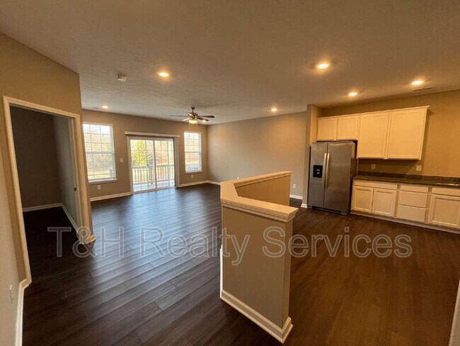 Building Photo - 5642 Brownstone Dr