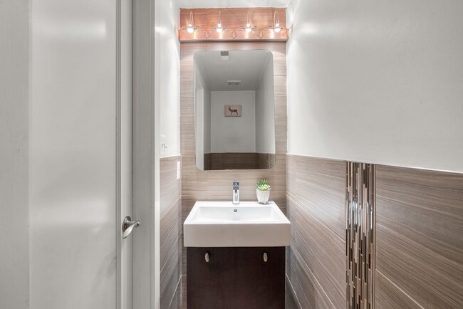 Building Photo - Stylish 2-Level Condo with Private Yard & Chef’s Kitchen Near Petworth Metro!