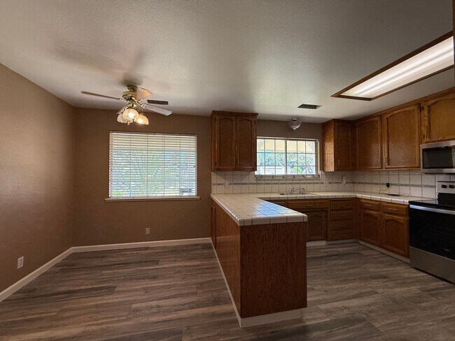 Building Photo - Stunning three-story home located in the c...