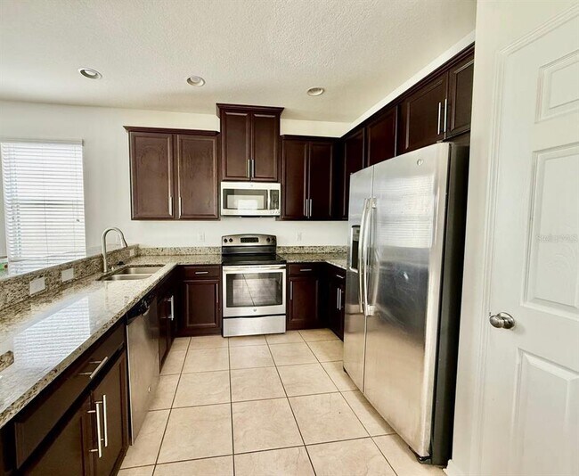 Building Photo - 7127 Nightshade Dr