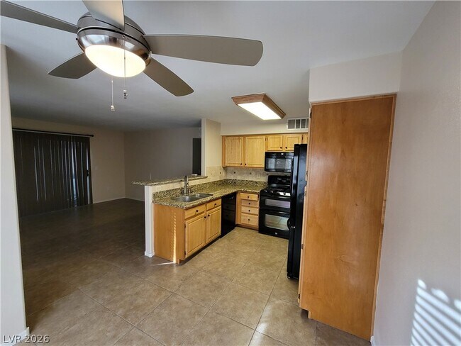 Building Photo - 5710 E Tropicana Ave