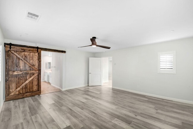 Building Photo - Modern 4-Bedroom Mira Loma Home with Designer Finishes & Open Floor Plan for Lease!