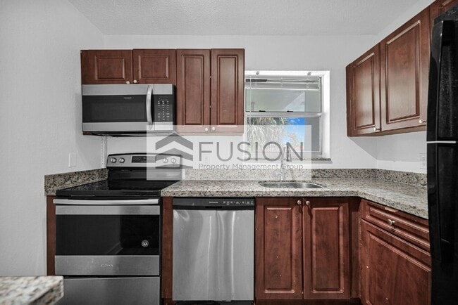 Building Photo - 400 NW 65th Ave