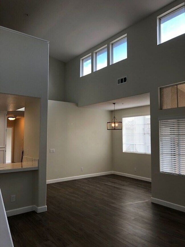 Building Photo - PICTURE PERFECT 2 BR/2 BATH PLUS LOFT END UNIT CONDO WITH DIRECT ACCESS 2 CAR GARAGE