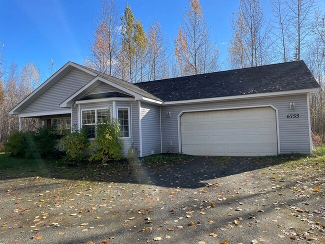 Building Photo - Ranch style 3bedroom/2 bathroom with an Oversized two car garage +giant carport!  Large private l...