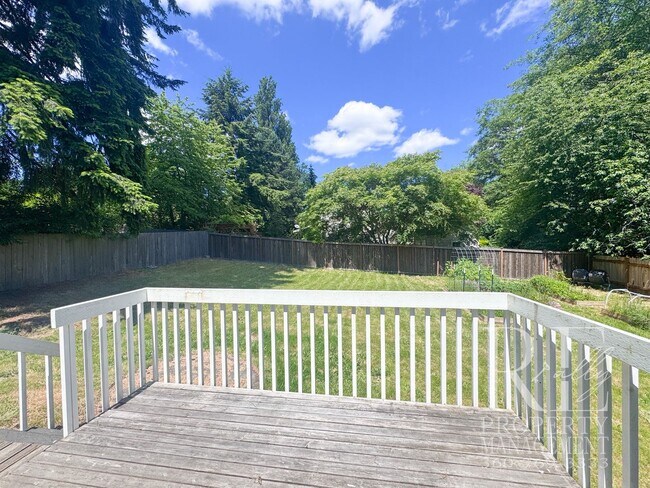 Building Photo - Spacious Poulsbo Home with Large Basement, Fenced Yard & Garden Space