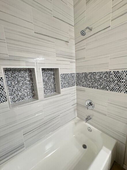 Tub to Ceiling tile with Mosaic - 8519 E Seabury Ct