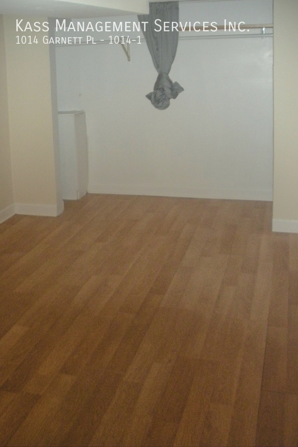 Building Photo - Very Spacious Duplex Apartment features 4 ...