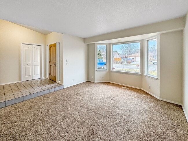 Building Photo - Spacious 3-Bedroom Home with 3-Car Garage, Fenced Yard & Easy Commute to Downtown Boise & BSU