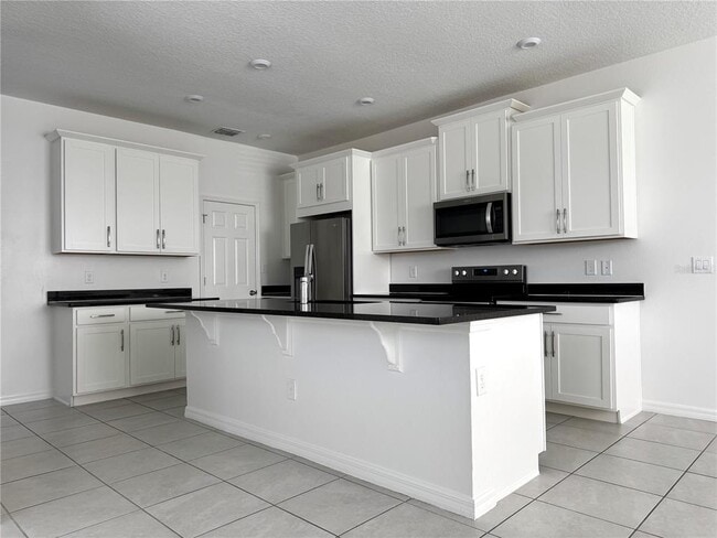 Building Photo - 8973 Matriarca Aly