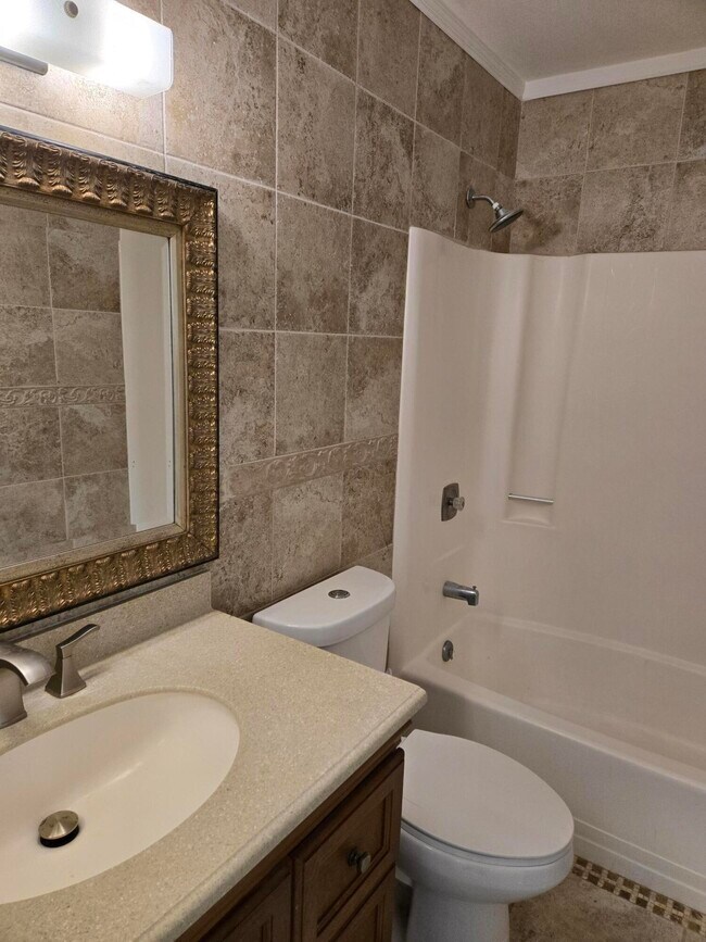 Building Photo - 3957 NW Cinnamon Tree Cir