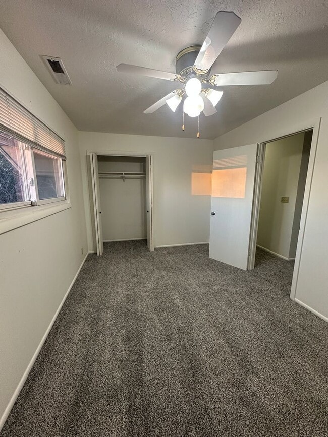 Building Photo - Spacious, three level, 4 Bed 2.5 bath Townhome in Ammon right behind the Walmart on Hitt.