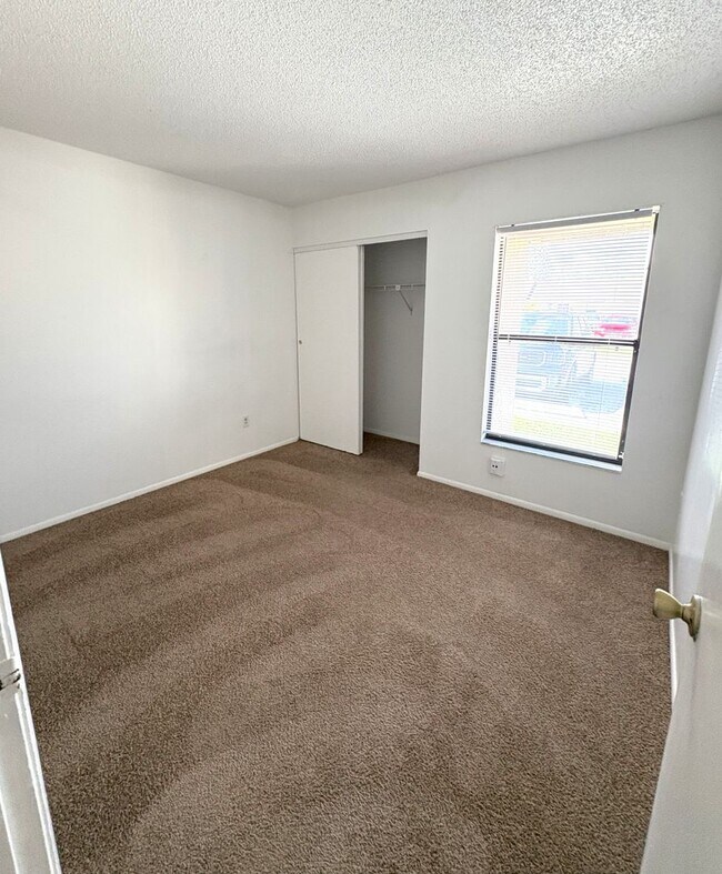 Building Photo - Charming 2-Bed, 2-Bath Home with Vaulted C...