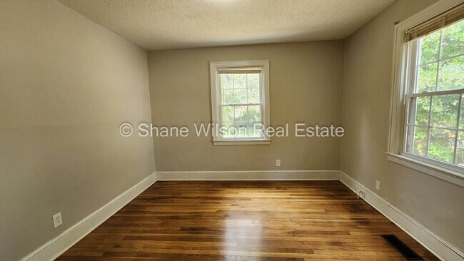 Building Photo - "Charming 4-Bed Chattanooga Home with Hard...