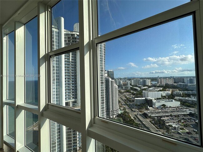 Building Photo - 18201 Collins Ave
