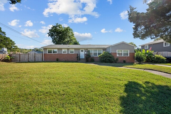 Primary Photo - Spacious 4-Bedroom Home with Modern Updates