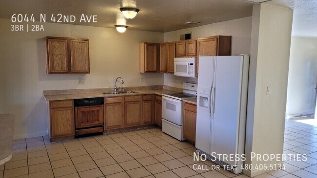 Building Photo - 6044 N 42nd Ave