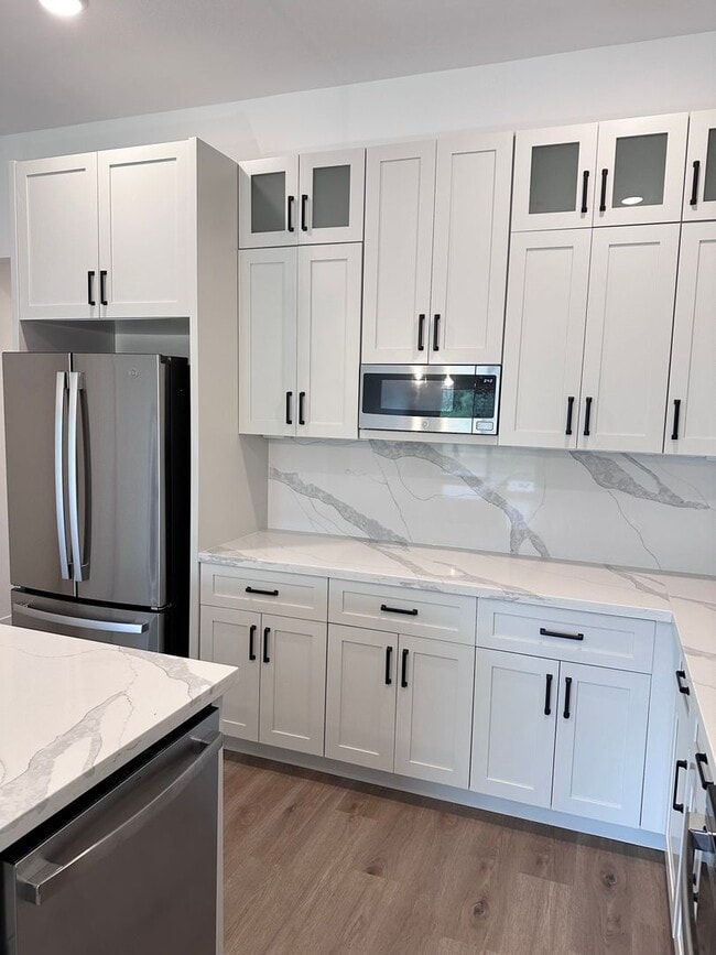 Building Photo - 3 Bed | 2 Bath | 1 Car Garage Single Level Duplex in Kansas City w/ Move In Special