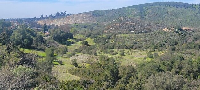 Building Photo - Charming 2BR Retreat with Private Patio, Scenic Views & Resort-Style Amenities