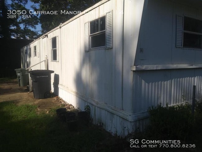 Building Photo - 3050 Carriage Manor Cir