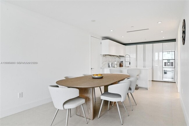 Building Photo - 10203 Collins Ave