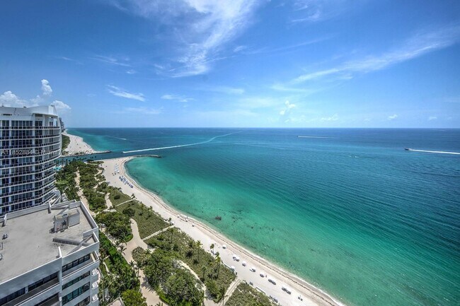 Building Photo - 10203 Collins Ave