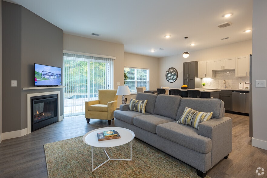 3BR, 2.5BA - 1,642SF - Living Room - The Summit at Harvey Townhomes