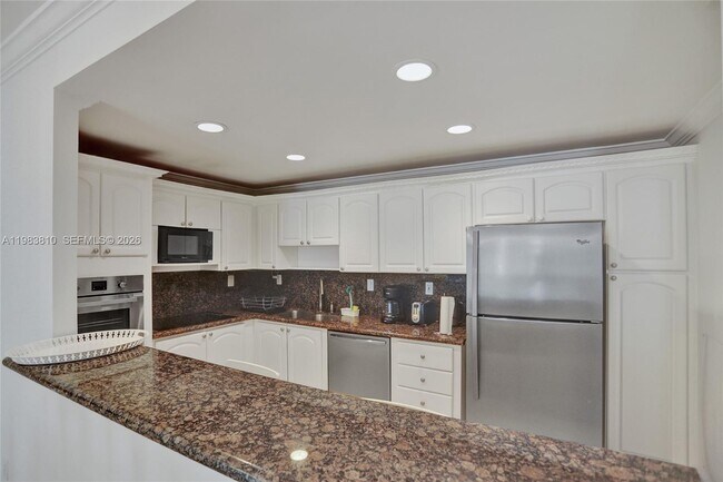 Building Photo - 19390 Collins Ave