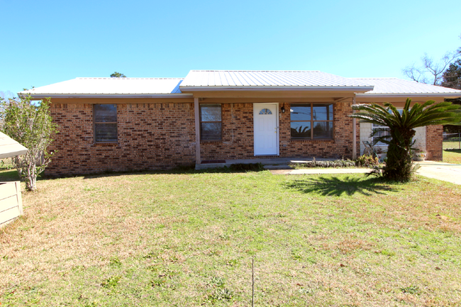 Primary Photo - Charming 3-Bedroom Brick Home on Half an A...