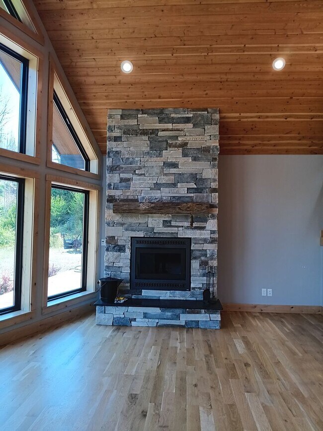 Building Photo - Beautiful Chalet Style Riverfront Property...