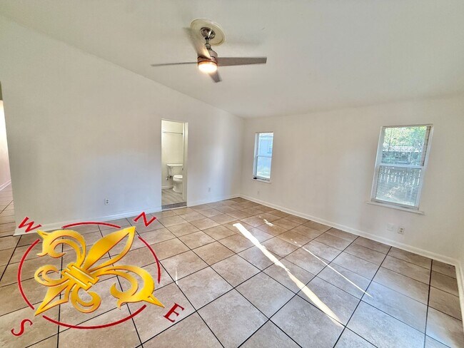 Building Photo - Spacious 4-Bedroom Home with Dual Living A...