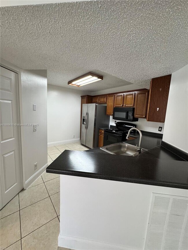 Building Photo - 8801 Wiles Rd