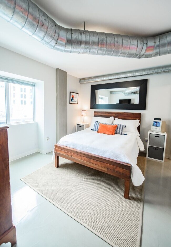 Building Photo - Authentically Cool Downtown Austin Condo | Walk Everywhere | Fully Furnished