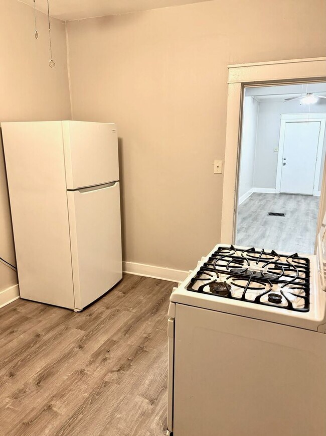 Building Photo - Updated home in West Louisville now availa...