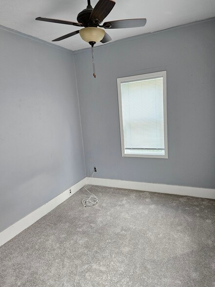 Bedroom #1 with new carpet and new Energy Efficient Windows - 2905 Apple St