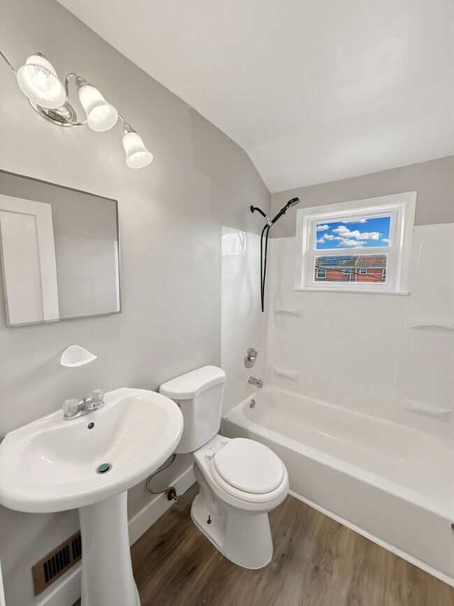 Building Photo - Spacious Dundalk Home with Finished Basement & Fireplace