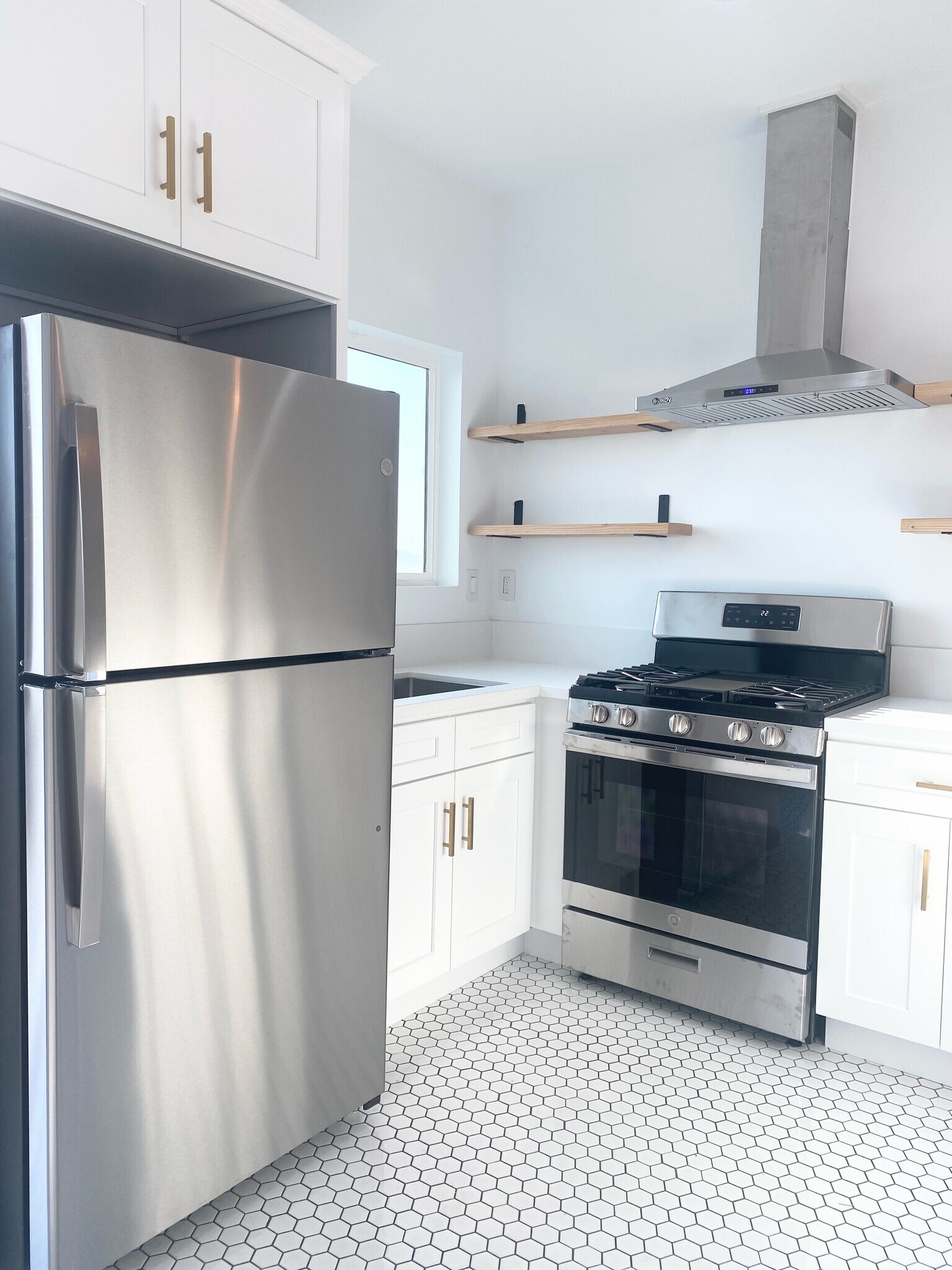 Kitchen with new fridge and stove. - 1334 Pennsylvania Ave