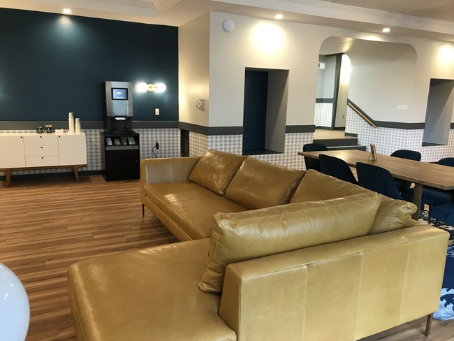 Lobby with complimentary hot beverage machine - Walnut Crossings