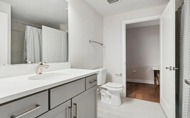Building Photo - Modern and Stunning 1 Bedroom, 1 Bath + Den Condo in the popular Lexicon – Available Now!