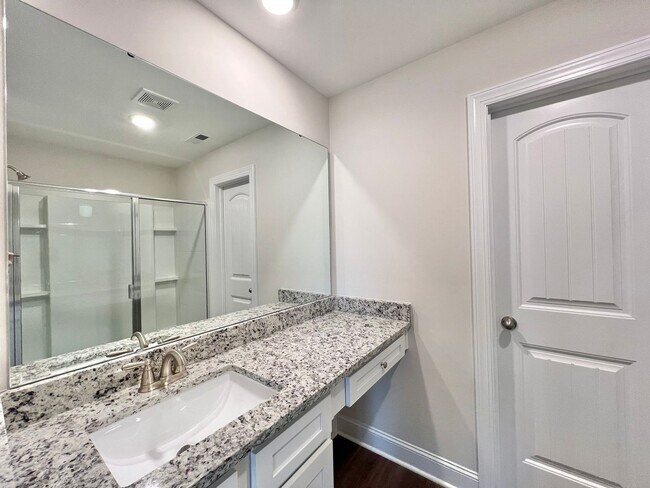 Building Photo - Stunning 3BD, 3BA End Unit Raleigh Townhome on a Corner Lot with High End Features in an HOA Comm...