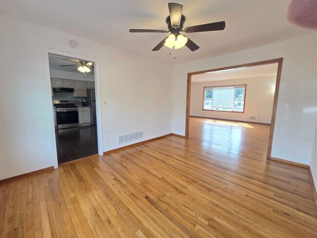 Building Photo - Updates abound at this SPACIOUS, half duplex with 3+ off-street parking spots, 3-bedrooms and 2 f...
