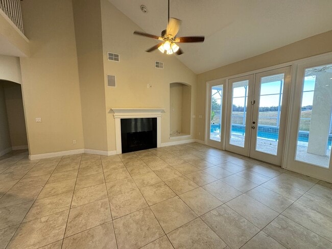 Building Photo - Spacious 4-Bedroom Home with Private Pool and Modern Comforts