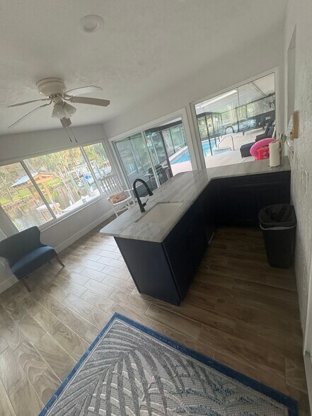 Enclosed Lanai with wet bar and ice maker - 11936 W Waterway Dr